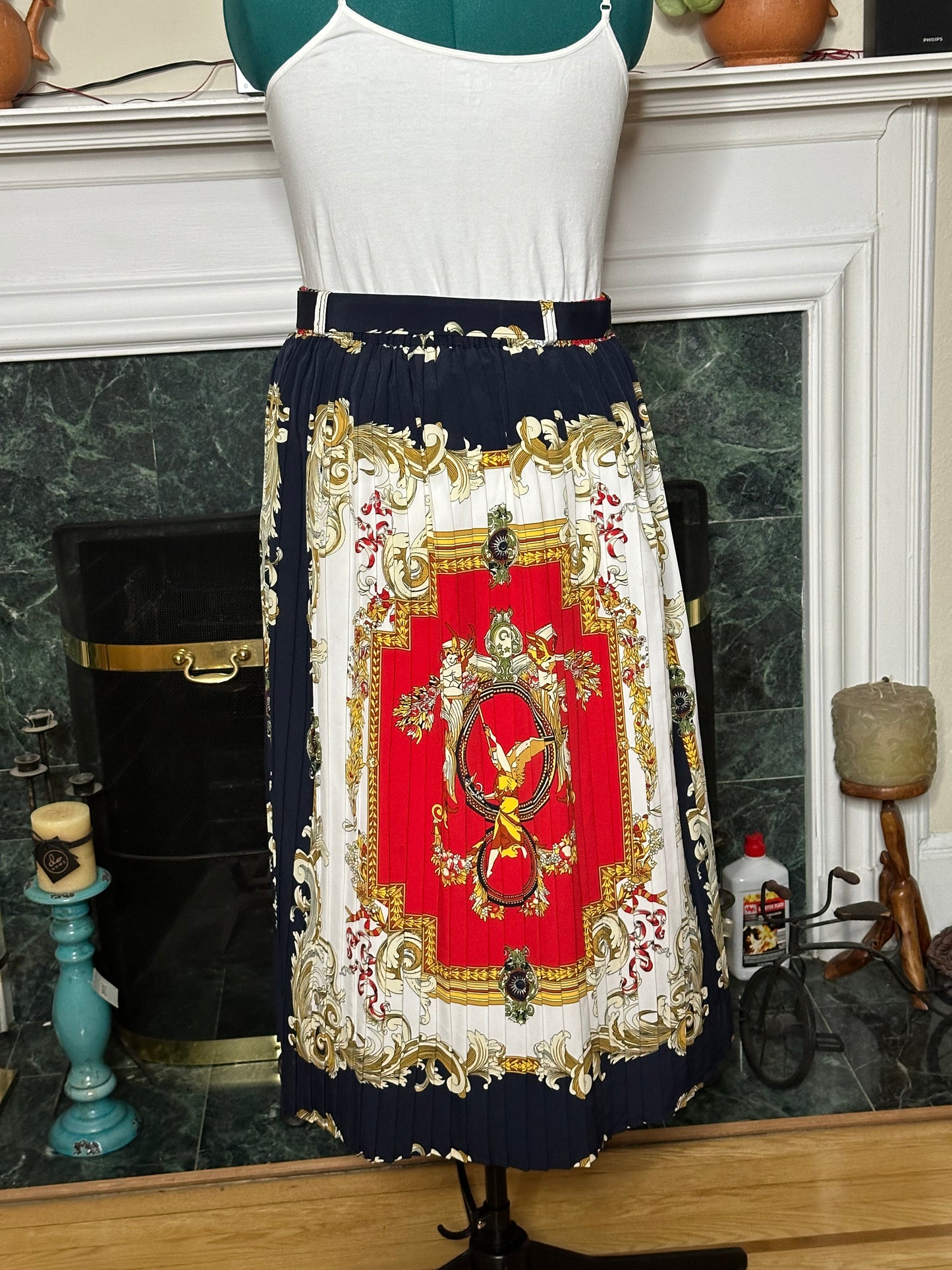 Red printed pleated skirt. elastic waist stretches to XL (42") Belt 36" length 34”