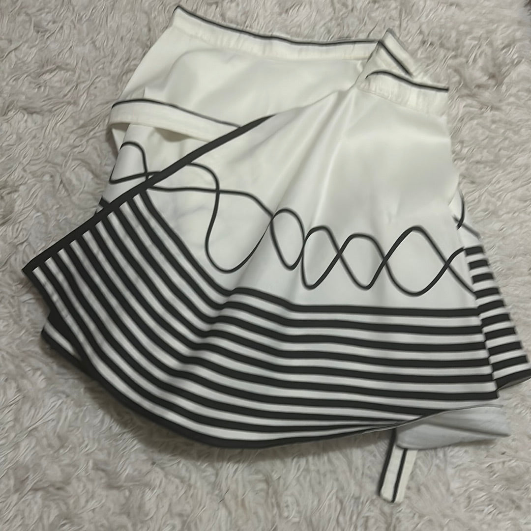 Mali-South Cream skirt trimmed in black