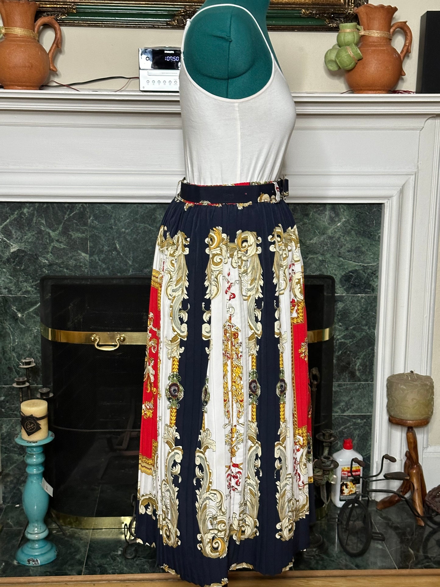 Red printed pleated skirt. elastic waist stretches to XL (42") Belt 36" length 34”