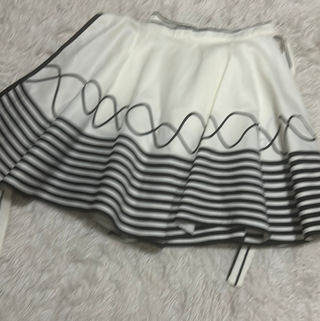 Mali-South Cream skirt trimmed in black